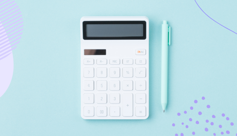 Photo of a white calculator and green pen on a light green background.