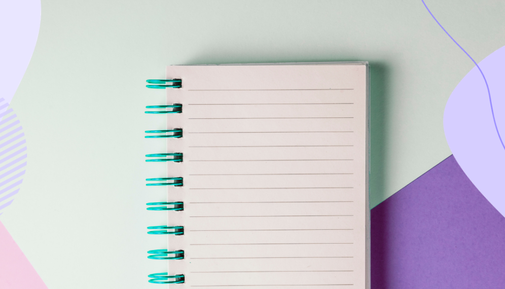 A blank page of a notebook on a green and purple background.